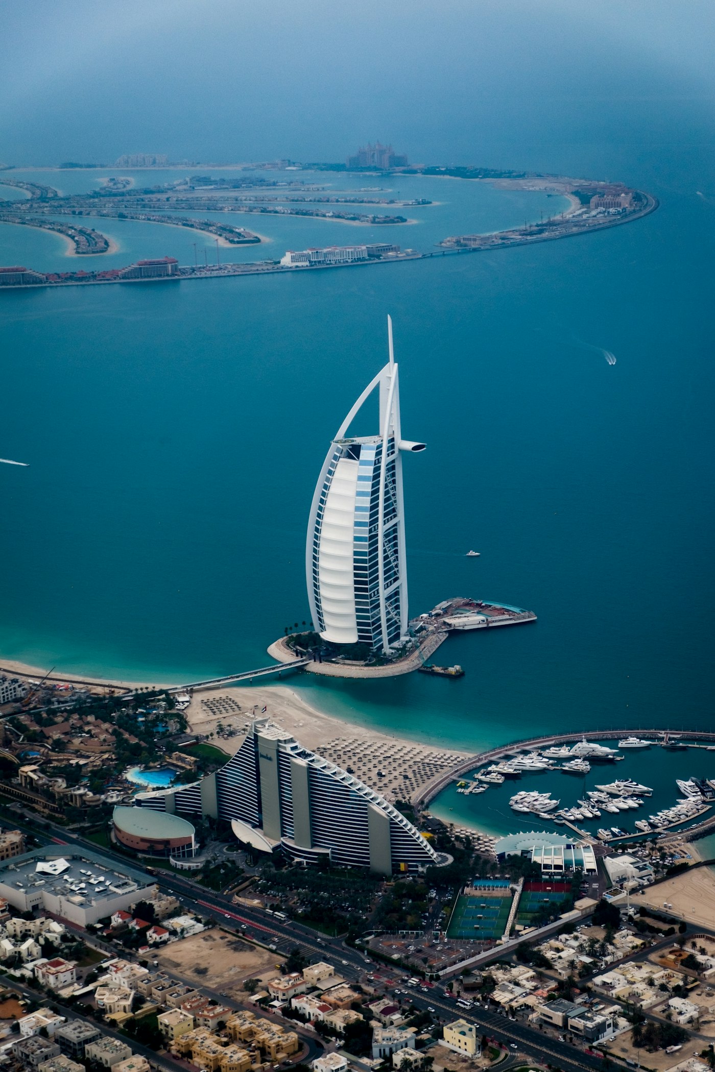 Dubai Marina towers at dusk representing UAE real estate app development