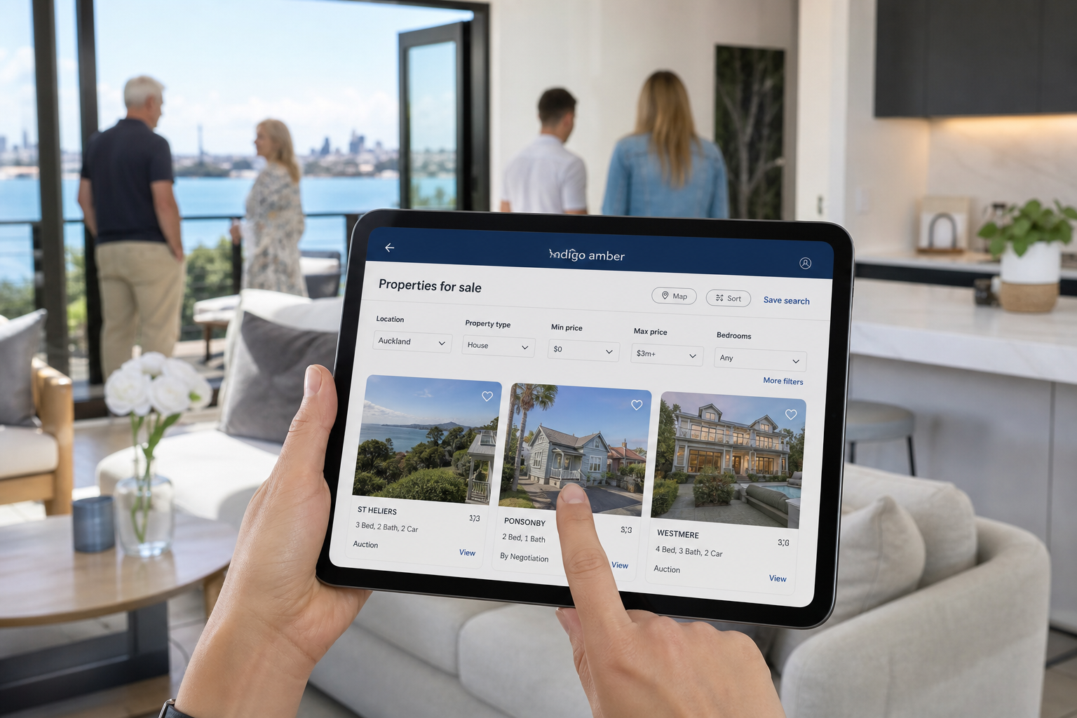 Sunny Auckland villa open home with a tablet showing original property search listings