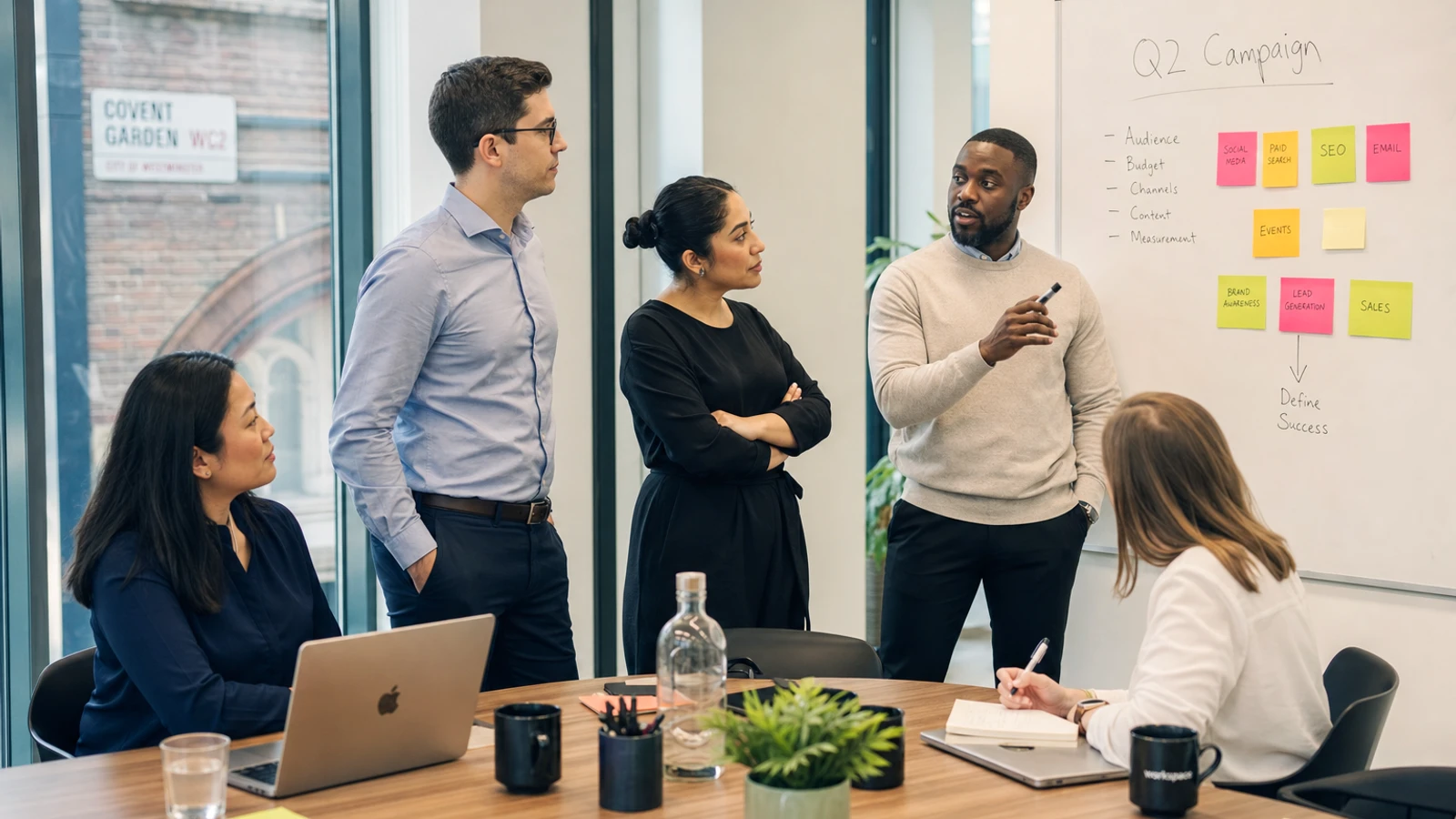 Ecommerce developers reviewing online store roadmap in London office