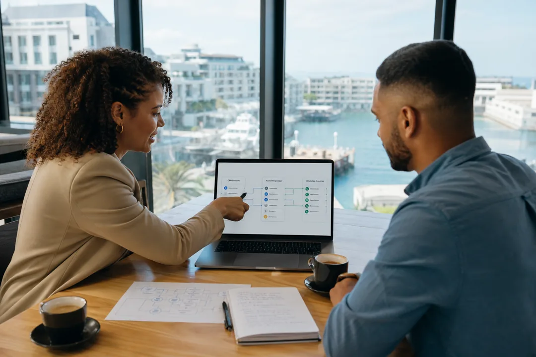 South African consultant reviewing HubSpot integration mapping with a business owner